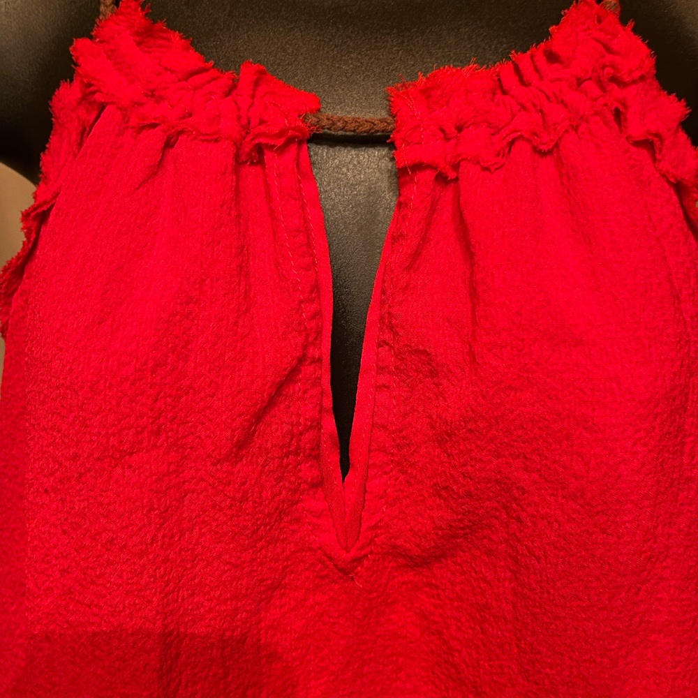 Red blouse no sleeves